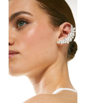 Take a shine to these cuff earrings. Designed with glistening diamantes set in a premium gold plate metal, they're a special touch to after-hours looks.Style: EarringsDesign: PlainFabric: MetalBrowse this seasons women's jewellery or discover the full range of women's accessories now.