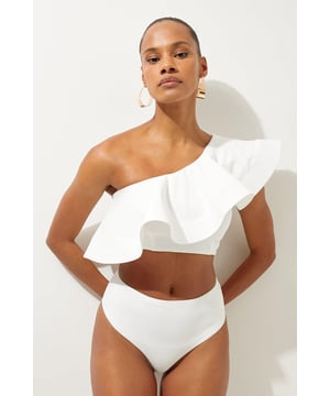 Welcome the sun with a bikini that will turn heads, the bottoms of which feature an ultra flattering high waisted design, and a high leg cut to elongate the legs. Style this piece with the matching top, as well as strappy sandals and a beach cover up for a holiday look that can be reworn time and time again. High Waist Bikini Bottom Cheeky Cut High Leg Design Flattering High Waisted Design Matching Top Sold Separately