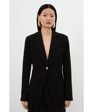 Radiate confidence in a tailored ensemble, with a blazer, tailor-made with a comfortable four-way-strecth fabric, a sleek design, and a fitted silhouette. Style this piece with the matching trousers and heels for a look that goes seamlessly from party nights to date nights. Compact Stretch Essential Single Breasted Tailored Blazer High Quality Stretch Fabric Clean, Sleek Design Plunging V Neckline Flattering Fitted Silhouette Button Front Fastening Matching Pieces Sold SeparatelyShop this seasons blazers or browse the full collection of coats and jackets now.