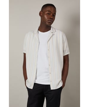 Textured stripe pattern adds subtle dimension to this classic short sleeve shirt
        Revere collar design offers a relaxed, open neckline perfect for warmer days
        Button-through front with clean finishing for effortless style
        Relaxed fit through the body provides comfortable all-day wear
        Versatile woven fabric with textural interest that maintains its shape throughout the day
    
    This Burton textured stripe shirt brings casual sophistication to your everyday wardrobe. The revere collar creates a laid-back yet put-together look that works brilliantly for various occasions. Style it as shown with dark trousers and a simple white t-shirt underneath for an effortless weekend ensemble, perfect for meeting mates at the pub or casual family gatherings. The textured stripe pattern adds character without overwhelming, making this shirt an excellent choice for summer barbecues or watching the match. For a smarter approach, pair with chinos and loafers. The versatile design transitions seamlessly from daytime casual to evening drinks, embodying Burton's commitment to practical yet stylish menswear that fits comfortably into the modern British man's lifestyle.