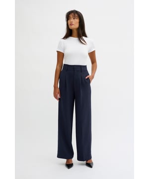 Tight fit,Hoge taille,Lange lengte,Relaxed  Chemisch laten reinigen, niet bleken, niet in de droger drogen, Druipnat ophangen in de schaduw, niet strijken, Chemisch laten reinigen.  52% Polyester (Gerecycled),41% Polyester,7% Elastaan