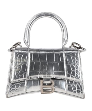 VINTAGE, RRP AS NEW
Elevate your accessory collection with the Balenciaga Crocodile Embossed Hourglass Top Handle Bag in silver calfskin leather. The sleek metallized crocodile-embossed leather creates an eye-catching, high-fashion look, while the curvilinear base and studded magnet closure provide both style and functionality. Featuring adjustable straps, aged-silver hardware, and the signature B logo, this bag is as practical as it is luxurious, lined with soft nappa lambskin for an extra touch of comfort.



with dust bag

Balenciaga Crocodile Embossed Hourglass Top Handle Bag in Silver Calfskin Leather
Condition: very good
Signs of wear: No retail tag, No visible sign of wear., 
Packaging: Dust bag
Color: silver
Material: Leather | sheep leather
Size: One Size | One Size
Measurements: Width: 70; Height: 130; Length: 195; Handle drop: 80; Strap length: 0
SKU: BAPUGBBA444235W