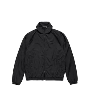 Mens adidas Originals x JJJJound Nylon Track Top in blackGoing back to the basics has never looked so bold. This adidas track top fuses minimalist styling with a rich heritage of sport. It represents the best of adidas and JJJJound  a design studio and brand that believes in the beauty of a pared-down aesthetic. Ribbed cuffs and a classic fit nod to athletic roots. In a subtle flex  the nylon build is all about clean lines and a smooth hand. Wear it alone or layer it up — the versatility is yours for the taking.- A track top made with the signature minimalist look of JJJJound.- Regular fit- Two-way full zip- 100% nylon (recycled)- Side pockets- Ribbed cuffs- Machine wash cold- Ref: IL8002