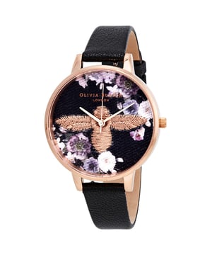 Olivia Burton OB16EM02 - Damenuhr Quarz aus Edelstahl• Material: Edelstahl• Glas: Mineral• Armband: Kunstleder• Farbe: Silber• Wasserbeständigkeit: 10 m (1 ATM)• Gehäusegröße: 38 mm