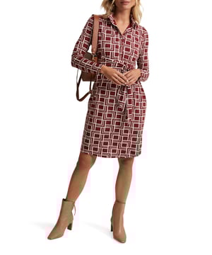 Embrace chic with the Montana Geo Shirt Shift Dress; perfect for work or weekends.