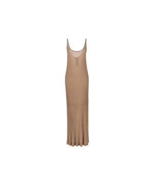 - Composición: 20% Fibra metálica 80% Viscosa - Sin mangas - Ribetes acanalados - Limpieza en seco - Cuello redondo - Diseño elástico - La modelo mide 180 cm y lleva la talla S - Tirantes finos - Fabricado en Extra UE - Género: MUJER -