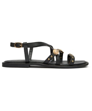 The Sole Dream Gladiator sandals combine timeless style with exceptional comfort. These elegant black leather flats feature decorative metal trims that add a touch of sophistication to any summer outfit. Your feet will thank you for the luxurious leather lining and padded insole that make every step a pleasure. Perfect for warm weather adventures or casual evenings out, these versatile sandals offer both classic appeal and all-day wearability without compromising on style.