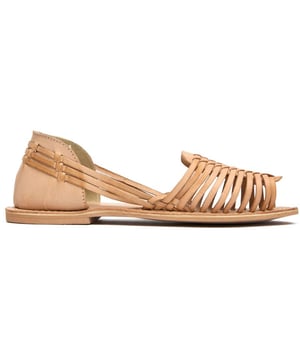 Embrace artisanal charm with the Sole Devin Huarache sandals. These women's flats showcase traditional huarache weaving in a natural leather finish that pairs beautifully with summer dresses or casual denim. The comfortable leather insock molds to your foot's contours while the durable synthetic sole provides reliable traction. Thoughtfully designed for both style and comfort, these versatile sandals offer a timeless silhouette that works effortlessly from beach to brunch.