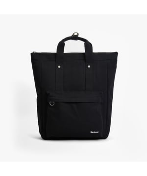 This lightweight women's backpack features adjustable straps, a padded laptop sleeve, and a cotton exterior, ideal for casual use and daily organization