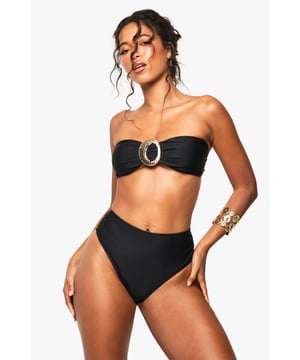 Bandeau-style bikini top with eye-catching gold-tone hardware
        High-waisted bottoms for a flattering silhouette
        Textured fabric adds visual interest and depth
        Strapless design perfect for minimising tan lines
        Versatile two-piece suitable for various beach activities
    
    Make waves this summer in this striking bandeau bikini set from Boohoo. The strapless top features a bold gold-tone accent, adding a touch of glamour to your beach ensemble. Paired with high-waisted bottoms, this swimwear set offers both style and comfort for your seaside adventures. The textured fabric adds a luxurious feel, while the classic design ensures you'll stand out whether you're lounging by the pool or taking a dip in the sea. Accessorise with oversized sunglasses and a wide-brimmed hat for the ultimate resort look. Perfect for your next sunny getaway or a day at the local lido, this bikini set is a must-have addition to your summer wardrobe. Its versatile design allows for easy mixing and matching with other swimwear pieces, giving you multiple styling options throughout the season.
