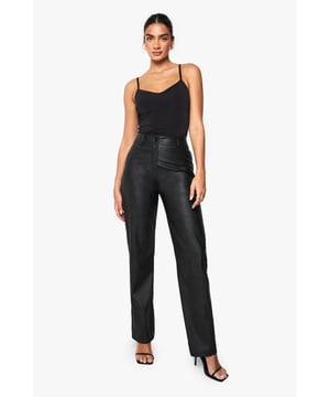 Wide leg design for a relaxed, on-trend silhouette
        High-waisted fit accentuates the waistline
        Leather-look finish adds a touch of edgy sophistication
        Belt loops for versatile styling options
        Straight fit through the hips for a flattering shape
    
    Make a bold statement with these wide leg leather-look trousers from Boohoo. Perfect for the fashion-forward woman who wants to stay ahead of the trends, these trousers offer a sleek and edgy alternative to traditional bottoms. The high-waisted design elongates your silhouette, while the wide leg cut provides comfort and movement. Style these trousers with a fitted crop top and blazer for a chic evening look, or dress them down with a casual jumper and trainers for a stylish daytime ensemble. Ideal for family gatherings or casual outings with friends, these versatile trousers can be easily dressed up or down to suit any occasion. Add a statement belt to define your waist or let them speak for themselves - either way, you'll be turning heads in these eye-catching trousers.