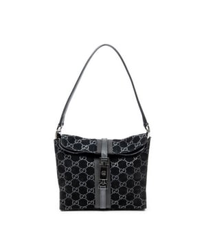 Gucci Tassen Fold Over Jackie  Schoudertas in de Zwart Kalfsleer in de Zilver  hardware. Het product is in In Zeer Goede Staat (AB).
  Afmetingen: 22x18x7.5 cm 
  Inclusief accessoires: None
      
  BrandCo Paris vindt zeldzame artikelen in de beste staat voor ongelooflijke prijzen. Het is de moeite waard om geduldig te zijn! Koop met vertrouwen: alle artikelen van BrandCo Paris worden zorgvuldig geselecteerd en geverifieerd door ons team van experts.

  Alle artikelen worden geleverd met een certificaat van echtheid en verpakt door BrandCo Paris.

  Classificatietabel voor de conditie van het artikel:

  N (als nieuw)
  AA (perfecte staat)
  A (uitstekende staat)
  AB (zeer goede staat)
  B (goede/redelijke staat)