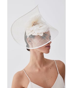 Get dressed up and finish the look with a fascinator, with a statement, large size and floral detailing, fitted onto a comfortable headband. Styles perfectly with a dress or pantsuit in matching tones for a look ideal for wedding guest days and days at the racecourse. Flower Trim Headband Fascinator Three Dimensional Flower Detailing Sheer, Structured Base Statement Large Size Easy to Wear HeadbandBrowse this seasons women's fascinators or discover the full range of women's accessories now.