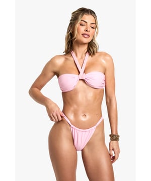 Stylish halterneck design with a distinctive front twist detail
        Bandeau-style top provides flattering support and coverage
        High-leg briefs for an elongating effect on the legs
        Secure clasp fastening at the back for adjustable fit
        Textured fabric adds visual interest and dimension
    
    Make a statement poolside with this eye-catching neckholder bikini set from Boohoo. The chic halterneck design features a trendy twist detail at the front, creating a fashionable focal point whilst providing comfortable support. Perfect for those sun-soaked getaways, this bikini pairs beautifully with oversized sunglasses and stacked bracelets as shown by our model. The high-leg briefs create a flattering silhouette that elongates your legs, whilst the bandeau-style top offers versatile wear. Whether you're lounging by the pool, strolling along the beach, or enjoying cocktails at a beach club, this bikini set delivers both style and comfort. Complete your beach look with a flowing kimono and metallic sandals for effortless holiday glamour.