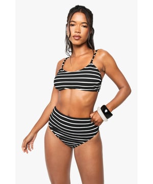 Textured knitted fabric with distinctive crinkle effect for added dimension
        Sporty crop-style top with flattering scoop neckline
        High-waisted bottoms offering comfortable coverage
        Adjustable thin straps for a customised fit
        Classic horizontal stripe pattern that never goes out of style
    
    Make waves this holiday season in our striking striped bikini set. The textured knitted fabric creates a sophisticated crinkle effect that catches the light beautifully whilst providing comfortable stretch. The crop-style top offers support without compromising on style, whilst the high-waisted bottoms flatter your natural curves. Perfect for beach days and poolside lounging, this two-piece set can be paired with oversized sunglasses and a lightweight kimono for trips to the beach bar. For a complete resort look, throw on a flowing maxi skirt and sandals when heading to lunch. The timeless stripe pattern ensures this bikini will remain a staple in your holiday wardrobe for seasons to come, embodying Boohoo's commitment to fashion-forward yet accessible swimwear.