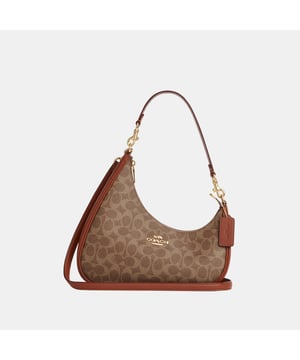 Twisted Teri Shoulder Bag in Signature Canvas, Inside multifunction pocket,  Length: 26.50 cm,  Width: 7.50 cm,  Height: 25.50 cm