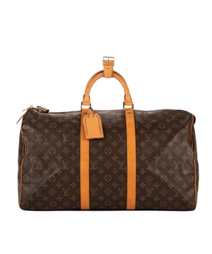Louis Vuitton Tassen Keepall 50 Reistas in de Bruin Gecoat canvas in de Gouden Messing  hardware. Het product is in In Uitstekende Staat (A).
  Afmetingen: 50x26x22 cm 
  Inclusief accessoires: Luggage Tag
      
  BrandCo Paris vindt zeldzame artikelen in de beste staat voor ongelooflijke prijzen. Het is de moeite waard om geduldig te zijn! Koop met vertrouwen: alle artikelen van BrandCo Paris worden zorgvuldig geselecteerd en geverifieerd door ons team van experts.

  Alle artikelen worden geleverd met een certificaat van echtheid en verpakt door BrandCo Paris.

  Classificatietabel voor de conditie van het artikel:

  N (als nieuw)
  AA (perfecte staat)
  A (uitstekende staat)
  AB (zeer goede staat)
  B (goede/redelijke staat)