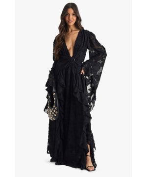 Striking textured chiffon fabric with intricate pattern
        Plunging V-neckline for a daring look
        Dramatic bell sleeves with cut-out details
        Cinched waist with statement buckle
        Thigh-high side slit for added allure
    
    Make a lasting impression with this show-stopping maxi dress from Boohoo. Perfect for those unforgettable nights out, this dress combines elegance with a touch of drama. The textured chiffon fabric adds depth and interest, while the plunging neckline and thigh-high slit create a sultry silhouette. The statement bell sleeves with cut-out details add a bohemian flair, making this dress a true head-turner. Style it with strappy heels and statement earrings for a night at the club, or dress it down with ankle boots for drinks at a trendy bar. The versatile design allows for endless styling options, ensuring you'll stand out in any social setting. Whether you're dancing the night away or enjoying cocktails with friends, this dress is designed to make you feel confident and fabulous.