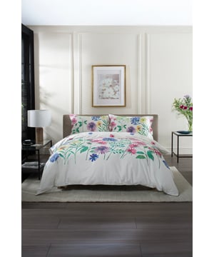 The Nothill bedding set brings a breath of fresh air to your bedroom with its vibrant, digitally printed floral design. The pattern features a variety of colorful blooms, creating a cheerful and inviting atmosphere. The bedding is crafted from 100% cotton, a natural and breathable fabric that ensures a comfortable sleep year-round. A 180 thread count provides a light and airy feel, while the neatly piped edges add a touch of sophistication. Available in a range of sizes, the Nothill set includes a duvet cover and pillowcase(s), allowing you to easily transform your bedroom into a tranquil floral retreat.