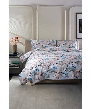 Transform your bedroom into a serene retreat with The Lyndon Company's Japanese Kyoto Printed Duvet Set. Crafted from luxurious 180 thread count Percale cotton, this set offers a soft, breathable feel for restful nights. The timeless design features a delicate blossom tree motif inspired by the tranquil beauty of a Japanese garden, adding a touch of sophistication to any space.