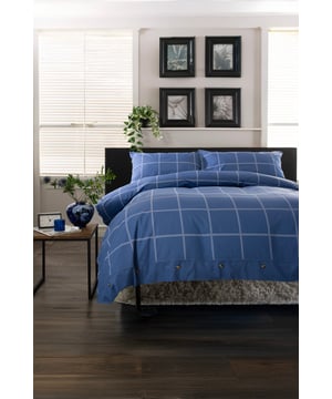 The Crossley Heath Duvet Set is crafted from 100% pure cotton for a naturally soft and breathable feel, featuring a timeless grid print complemented by piped cuffs and mock horn button detailing for a refined finish. With a 144 thread count, it offers the perfect balance of durability and comfort, making it ideal for everyday use and all-season appeal.