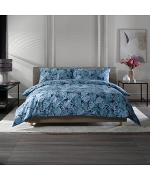 Experience the ultimate in luxury and comfort with The Lyndon Company's Japanese printed tropical garden design duvet sets, crafted from 180 thread count percale cotton for a soft, breathable sleep experience that elevates your bedroom aesthetic. With vibrant colors, intricate patterns, and a piped edge finish, these stylish duvet covers combine functionality and elegance, transforming your space into a tranquil escape inspired by nature's beauty.