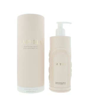 Transform your daily cleansing ritual into a moment of pure indulgence with the La Perla Soothing Bath and Shower Oil. This luxurious oil is expertly formulated to gently cleanse while deeply nourishing the skin, enveloping your body in a soft veil of hydration and comfort.  

Infused with a calming blend of botanical oils and La Perla’s signature scent, the formula emulsifies upon contact with water, creating a delicate lather that soothes the senses and leaves the skin feeling silky-smooth and radiant.

Ideal for all skin types, it helps to restore moisture, support the skin’s natural barrier, and deliver a spa-like experience in the comfort of your own home. 

Beautifully presented in a sleek, sustainable bottle, it is both a self-care essential and an elegant addition to your bath and body ritual.  

How to Use: 

For bath: Pour a few drops under warm running water and swirl to disperse. Soak and relax as the oil hydrates and calms the skin. 

For shower: Apply directly to damp skin and massage gently in circular motions. Rinse thoroughly to reveal soft, nourished skin. Use daily for best results.