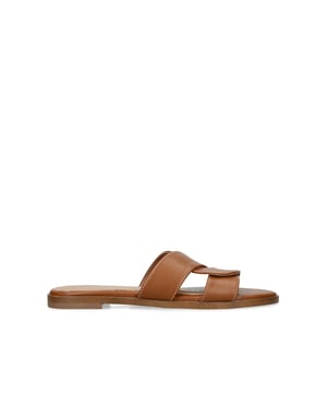 The KG Kurt Geiger Rose is a slip-on sandal in gold. The strap is constructed from gold rope matching the gold toe plate.
