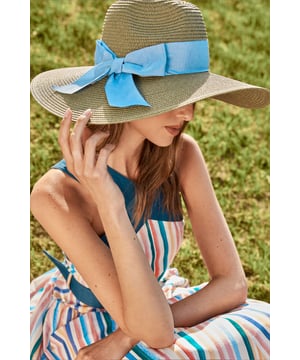 Beautifully woven straw hat with a wide, structured brim for optimal sun protection
        Statement bow detail adds a touch of feminine charm and sophistication
        Versatile design perfect for summer occasions and outdoor events
        Lightweight construction ensures comfort throughout the day
        Structured crown maintains its elegant shape for a polished appearance
    
    The Lisa Tan Summer Straw Hat from Coast is the quintessential accessory for the discerning lady attending summer's most prestigious events. This beautifully crafted hat features a generous brim that provides welcome shade whilst framing your face with undeniable elegance. The striking bow detail creates a focal point that conveys refined taste and attention to detail. Style with a flowing summer dress and delicate jewellery for race day sophistication, or pair with a tailored ensemble for wedding guest perfection. The versatile design complements both casual garden party attire and formal occasion wear with equal aplomb. Whether you're sipping champagne at a summer soire or attending a sophisticated outdoor ceremony, this hat will ensure you display poise and grace whilst keeping you comfortably shaded from the summer sun.