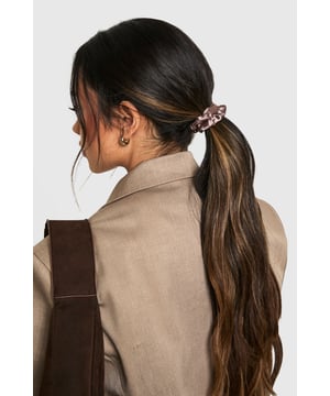 Set of multiple satin-finish scrunchies
        Variety of neutral tones for versatile styling
        Soft, gentle fabric to minimise hair damage
        Elastic core for secure hold
        Voluminous design adds texture to hairstyles
    
    Elevate your everyday hairstyles with this chic multipack of satin-finish scrunchies. Perfect for the fashion-forward woman who values both style and hair health, these scrunchies offer a gentle alternative to traditional hair ties. The luxurious satin finish not only looks sleek but also helps reduce friction and breakage, keeping your tresses in top condition. With a range of neutral hues, these versatile accessories complement any outfit, from casual daywear to more polished evening looks. Use them to create effortless ponytails, messy buns, or half-up styles for family gatherings, brunch dates, or lazy weekends. The voluminous design adds a touch of retro charm while providing ample hold for various hair types and textures. Mix and match these scrunchies to customise your look and add a playful element to your hair game.