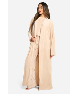 Luxuriously soft fleece fabric for ultimate comfort
        Full-length design for complete coverage
        Ribbed texture adds a stylish touch
        Belted waist for a customisable fit
        Versatile open front for easy wear
    
    Wrap yourself in cosy comfort with this ribbed fleece dressing gown from Boohoo. Perfect for lazy mornings and relaxing evenings, this full-length robe offers both warmth and style. The textured ribbed design adds a fashionable element to your nightwear collection, while the belted waist allows you to adjust the fit to your liking. Whether you're enjoying a cup of tea on the sofa or getting ready for bed, this versatile piece is an essential addition to your loungewear wardrobe. Pair it with your favourite pyjamas or wear it over a nightie for a complete look that's both practical and on-trend. Ideal for year-round use, this dressing gown is a must-have for the fashion-forward woman who values comfort without compromising on style.