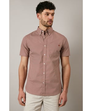 Distinctive geo print pattern creates visual interest across the entire shirt
        Classic button-down collar for a smart-casual finish
        Short sleeves with neat hems perfect for warmer weather
        Signature Maine embroidered logo detail on chest
        Centre back pleat for enhanced comfort and movement
    
    This Maine geo print shirt combines contemporary pattern with timeless design for versatile summer styling. The pure cotton fabric ensures breathability and comfort throughout the day, whilst the structured button-down collar maintains a refined appearance even when worn casually. Style as seen with neutral shorts and white trainers for relaxed weekend brunches or garden gatherings. For evening socials, pair with chinos and loafers for an effortlessly sophisticated look. The subtle geometric pattern works brilliantly with solid-coloured bottoms, allowing the shirt to be the focal point of your ensemble. Perfect for holidays, casual Fridays at the office, or simply elevating your everyday wardrobe with a touch of considered pattern.