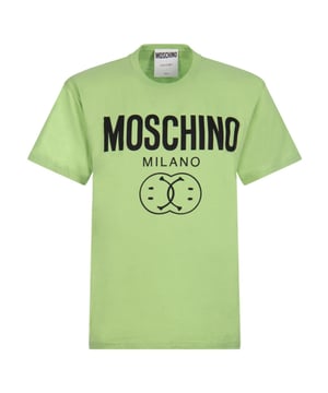 Elevate your casual wardrobe with the Moschino Milano Double Smiley Green T-Shirt, a vibrant piece that combines playful design with premium comfort. Crafted from soft, breathable fabric, this t-shirt features Moschino's iconic double smiley graphic in bold green, making it a standout choice for those who love to express their unique style. Perfect for pairing with jeans or layering under a jacket, it offers both versatility and a fresh pop of color. Embrace a fun, confident look that turns heads wherever you go with this must-have addition to your collection. Made in Portugal, 100% Cotton