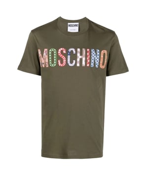 Elevate your casual wardrobe with the Moschino Bold Embroidered Multi Logo Green T-Shirt. Crafted with attention to detail, this vibrant green tee features striking multi-logo embroidery that showcases Moschino's iconic style. Made from high-quality materials, it offers a comfortable fit perfect for everyday wear or making a statement at social gatherings. The bold design adds a fresh, contemporary edge to your outfit, ensuring you stand out effortlessly. Ideal for fashion enthusiasts who appreciate unique, standout pieces, this T-shirt combines comfort and luxury in one versatile garment. Make it a key part of your collection today. Made in Portugal, 100% Cotton