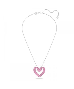 Embodying the beauty of nature with its double swan design, this heart-shaped pendant symbolizes the power of everlasting love and is a new beginning for the Swarovski swan logo. It features refined pavé crystals in a striking pink color and is set on a rhodium-plated chain. The ultimate choice for a playful statement, whether day or night. This pendant is part of the Sublima family, designed for Collection III.\n Measures: Minimum length: 42 cm.\n Maximum length: 47 cm.\n Width: 3.5 cm.\n Composition: Material: Crystals, Rhodium plating\n Care:\nAvoid contact with creams, perfumes and detergents that may damage the product. To maintain its shine, we recommend cleaning it only with a soft cloth.