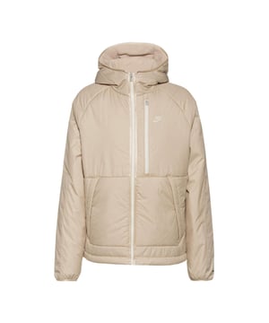 Experience comfort and style with the Nike Plain Light Brown Jacket, crafted from 100% polyester with Nike Therma-FIT technology to keep you warm and dry. This water-repellent jacket features a full zip fastening for easy wear, two front pockets secured with buttons, and a zippered left breast pocket for added convenience. The attached hood offers extra protection against the elements, while the iconic Nike badge on the left breast adds a touch of sporty elegance. Perfect for everyday wear or outdoor activities, this jacket combines functionality with a sleek, modern look