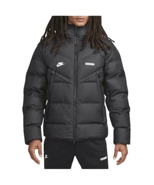 The Nike Black Air Max Jacket combines style and functionality for everyday wear. Crafted from 100% polyester, this men's jacket offers durability and lightweight comfort. It features a full zip fastening and an attached hood for adjustable coverage in changing weather. Elasticated cuffs ensure a snug fit, while two front zip pockets provide secure storage for essentials. The iconic Nike logo on the right chest and the Air Max patch on the left add a sporty, authentic touch. Perfect for casual outings or active days, this jacket delivers both performance and a sleek, modern look