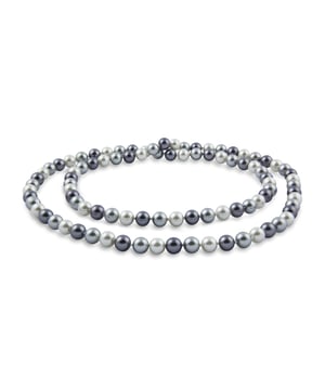 Mallorca Pearl Necklace: elegance in motion with a contemporary essence.\n\n This long necklace stands out for its combination of Mallorcan pearls in contrasting tones, creating a harmonious and sophisticated visual rhythm. Its clasp-free design allows it to be worn in one or two wraps, easily adapting to different styles and occasions.\n\n Details:\n - Handcrafted in Mallorca using the traditional method.\n - Uniform Majorcan pearls, with a polished finish and silky feel.\n - Alternating tones that add dynamism and personality to the piece.\n - Long design without closure, designed to be worn in one or two wraps.\n - Strong threading maintains the shape and flow of the necklace.\n\n A distinctive accessory that balances modernity and tradition. Ideal for those seeking a versatile, elegant accessory full of artisanal identity.\n Measures: Length: 97 cm\n Composition: Pearls\n Care:\nAvoid contact with perfumes, creams and chemicals.