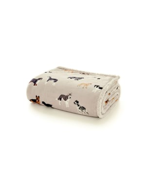 Add a playful and heartwarming touch to your home with the Mixed Dogs Sherpa Fleece Throw Blanket. Perfect for dog lovers of all ages, this generously sized 140x180cm throw features a charming all-over print of assorted dog breeds on a soft oatmeal background. Crafted from high-quality 220gsm printed flannel, the front is beautifully smooth and vibrant, while the reverse is made from plush 200gsm Sherpa fleece for extra warmth and comfort. Whether draped over your bed, sofa, or armchair, it delivers snuggly softness and adorable style in equal measure. Ideal for cozy nights in, pet-themed interiors, or as a thoughtful gift for dog enthusiasts, this 100% polyester throw is both machine washable and made to last—bringing comfort and cuteness to any corner of your home.