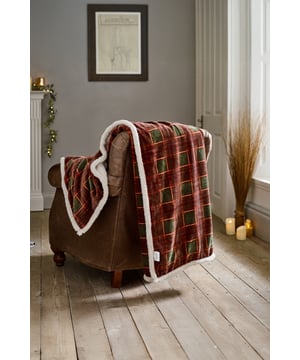 Elevate your home comfort with the Luxury Rowin Tartan Sherpa Fleece Throw Blanket, designed to bring warmth, style, and softness to any space. Showcasing a rich red and green heritage-inspired check pattern, this plush throw combines classic country charm with modern coziness. The front features a velvety fleece surface that’s gentle to the touch, while the reverse side is lined with thick, fluffy white Sherpa for superior warmth and insulation. Ideal for draping over your sofa, armchair, or bed, it adds an inviting layer of texture and color to your décor. Perfect for chilly evenings, cozy movie nights, or as an extra layer in the bedroom, this soft throw blanket is both functional and decorative—making it an essential for any season. A beautiful gift idea or stylish upgrade for your own home.