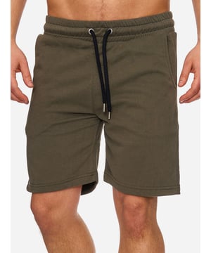 Artikelbeschreibung


	Bequeme Herren Jogging Shorts von Tazzio
	
Verschluss: Tunnelzugband
	
Hosentaschen: Eingrifftaschen, Gesäßtasche
	Basic Style
	Gerippter Bund
	Elastisches Material für eine bessere Passform
	Lockerer Tragekomfort
	Qualitativ hochwertige Verarbeitung der Materialien


Passform


	
Passform: Regular Fit
	
Länge: Kurz
	
Leibhöhe: Normal


Material &amp; Pflege


	
Material Oberstoff: 90% Baumwolle, 10% Elasthan
	
Materialkonstruktion: Sweatware
	
Elastizität: Leicht elastisch
	
Pflegehinweise: Maschinenwäsche