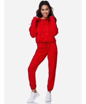 Moderner &amp; zeitloser Damen Jogginganzug von Tazzio
	Passform: Regular Fit
	Verschluss: Tunnelzugband, elastischer Bund
	SET bestehend aus Oberteil mit Kapuze &amp; Hose: Tunnelzug
	2 Taschen vorne bei der Jogginghose
	Hochwertiges Material &amp; bequem zu tragen
	Idealer Sportanzug für das ganze Jahr