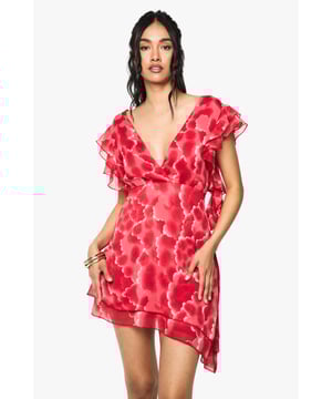 Flirty plunge neckline creates a striking focal point
        Delicate chiffon fabric with all-over floral pattern for a feminine touch
        Romantic ruffle detailing on the short sleeves adds movement and dimension
        Asymmetric hemline with lace trim creates visual interest
        Mini length silhouette perfect for showcasing your legs
    
    Make a statement at your next casual gathering in this enchanting chiffon mini dress from Boohoo. The eye-catching plunge neckline and fluttery ruffle sleeves create a playful yet sophisticated silhouette that's perfect for day-to-night transitions. The asymmetric hemline with delicate lace trim adds a contemporary twist to this feminine piece. Style with strappy sandals and minimal gold jewellery as seen on our model for family gatherings or weekend brunches. For cooler evenings, layer with a cropped denim jacket and ankle boots. This versatile dress works beautifully for garden parties, casual dates, or styled with trainers for a more relaxed daytime look. The lightweight chiffon fabric ensures comfort while maintaining that effortlessly chic aesthetic that's quintessentially Boohoo.