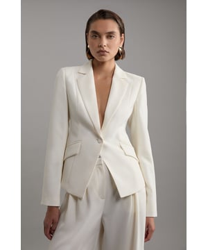 The perfect choice for transitioning seasons , this jacket is designed with a relaxed fit and a simple, easy to style design. Style it with anything, from jeans to tailored separates for looks that will take you from office days to coffee catch ups.  Tailored Crepe Single Breasted Blazer Jacket High Quality Crepe Fabric Plunging V Neckline Comfortable, Relaxed Fit Unique, Military Style Pocket Accents Button Front FasteningShop this seasons blazers or browse the full collection of coats and jackets now.Matching piece sold separately.