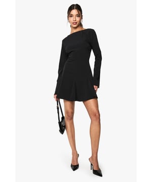 Textured bubble crepe fabric adds depth and interest
        Flattering slash neckline for a modern touch
        Long sleeves with subtle flare for added drama
        Mini length perfect for showcasing legs
        Versatile design suitable for various casual occasions
    
    This structured long-sleeved mini dress from Boohoo is a versatile addition to your wardrobe, perfect for the fashion-forward woman who values both style and comfort. The textured bubble crepe fabric adds a tactile element, while the slash neckline offers a contemporary twist on a classic silhouette. The long sleeves with a subtle flare provide an elegant touch, making this dress suitable for a range of casual events. Style it with trainers and a denim jacket for a laid-back daytime look, or dress it up with heeled ankle boots and statement earrings for an evening out with friends. The mini length is ideal for showcasing your legs, while the structured design ensures a flattering fit. This dress is a go-to choice for family gatherings, brunches, or casual outings where you want to look effortlessly chic without compromising on comfort.
