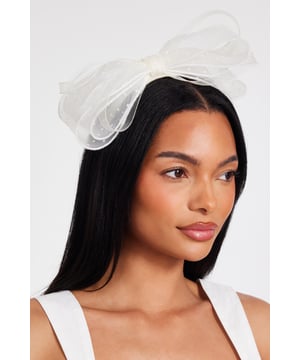 - Bow shape - Polka dot print - Headband - Excluding trims