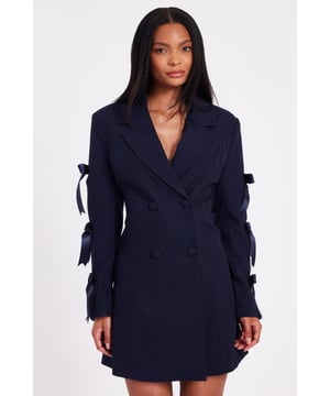 - Double breasted - Bow sleeves - Button front - Tailored look - Model height: 5'6" - Model wears uk 8 / us 4 / eur 36 - Always check the wash care label - Cool hand wash with mild detergent