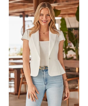 Making every outfit look chic Cut for a figure-enhancing hourglass fit Framed by elegant cap sleeves Sleek single-breasted fastening Style with wide-leg trousers for a fresh take on tailoring Pair with a pleated midi skirt and heels for a chic occasion outfit