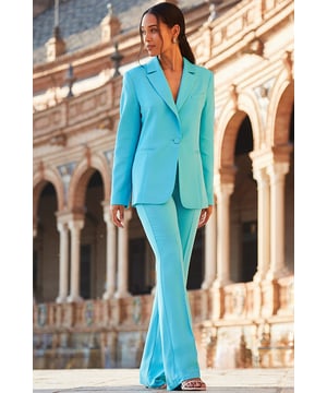 Head-turning trousersFlared silhouette makes your legs look endlessFitted at the waist to hug your curvesMood-boosting turquoise hueAdd the matching blazer for maximum impactWe love them with metallic heelsInside leg to fit: Short 29" | Regular 31" | Long 33"