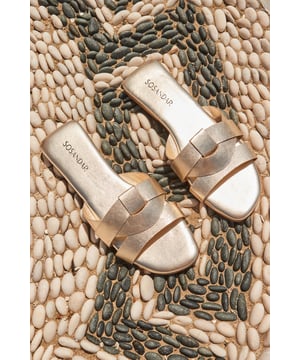 Warning: you won't want to take them offCrafted from luxe champagne leather Statement cross strap design for a secure fit Chic square toe They'll take you from beach to bar Style with denim shorts and a vest top or summer dresses